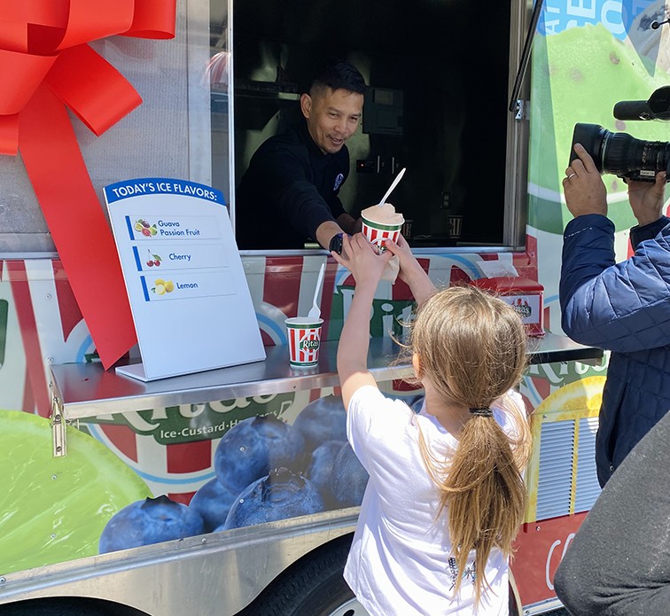 Hezrron handing out italian ice