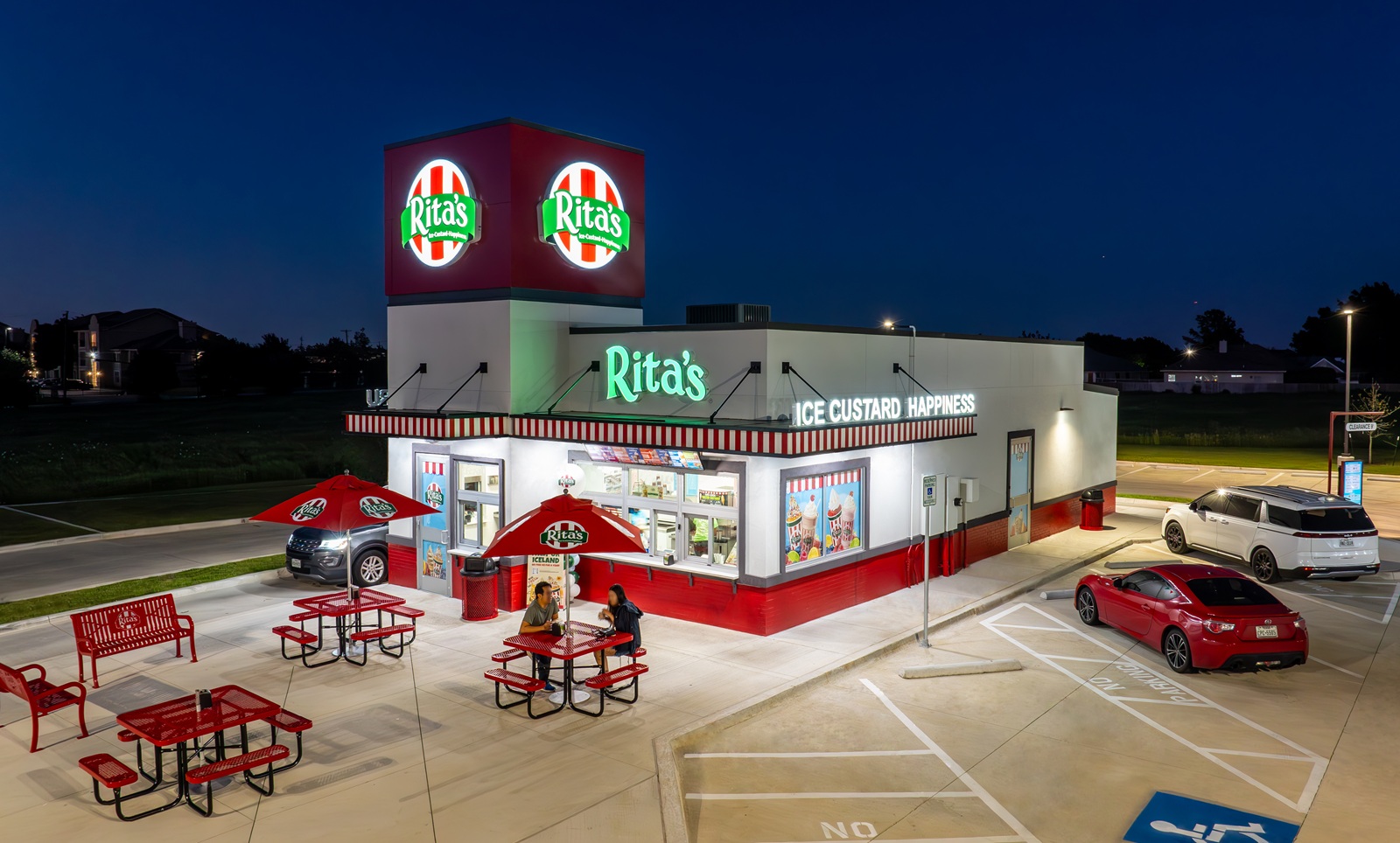 Rita's Italian Ice franchise exterior at night